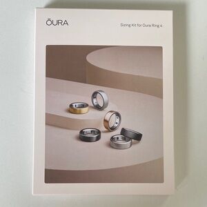 Oura Ring sizing kit with black, silver, gold rings